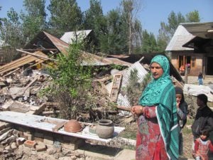 <p>Thousands of dwellings were  destroyed by the September 2014 floods in Kashmir (Image: Athar Parvaiz)</p>