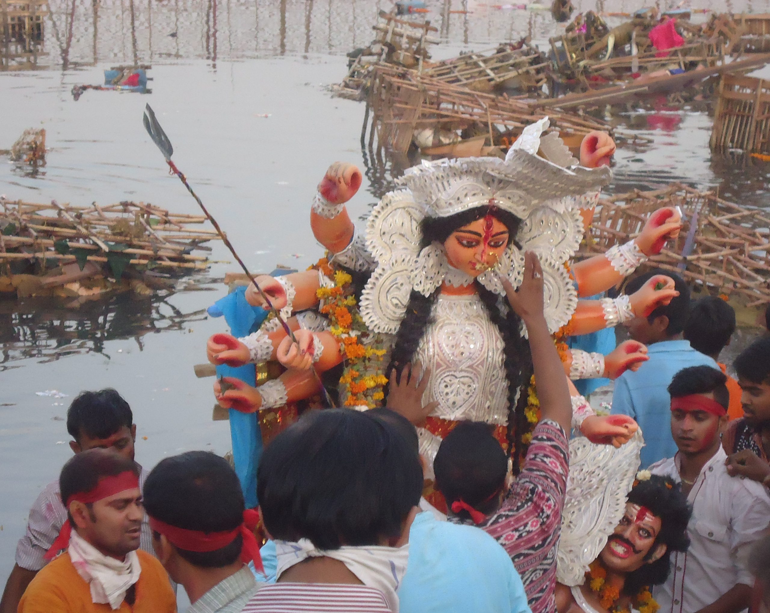<p>Durja Puja festival on the banks of the Yamuna, one of the rivers granted status of living human entities by the Uttarakhand court (Photo by Juhi Chaudhary)</p>