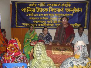 <p>Chandrika Banerjee speaking at an event (image by Nakshikantha Mohila Unnayan Sangstha) </p>