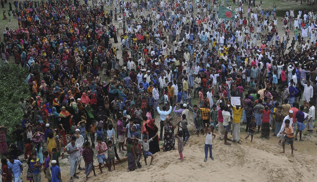 <p>Residents of Gondamara in coastal Bangladesh gather to protest the building of a coal-fired power plant in their village [Image by Minhaz]</p>