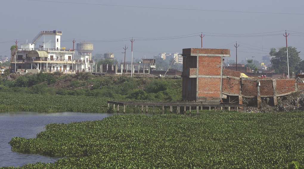 <p>Uncontrolled urbanisation &#8211; such as this construction in a lake &#8211; has led to the loss of waterbodies [image by GEAG]</p>