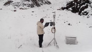 <p>Researcher collecting data from remote monitoring site [image courtesy: WAPDA] </p>