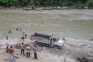 sandmining in India in the Trishuli river, Dhadhing
