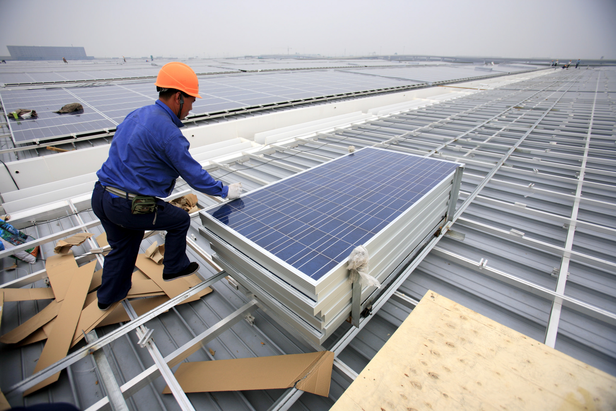 <p>Solar roof installation in Shanghai, China. (Image: Jiri Rezac)</p>