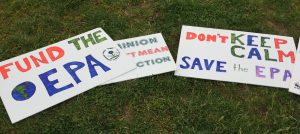 <p>Posters from the People&#8217;s Climate March in Washington DC on 27 April 2017 [image by: Becker1999 (Paul and Cathy) / LinkedIn]</p>