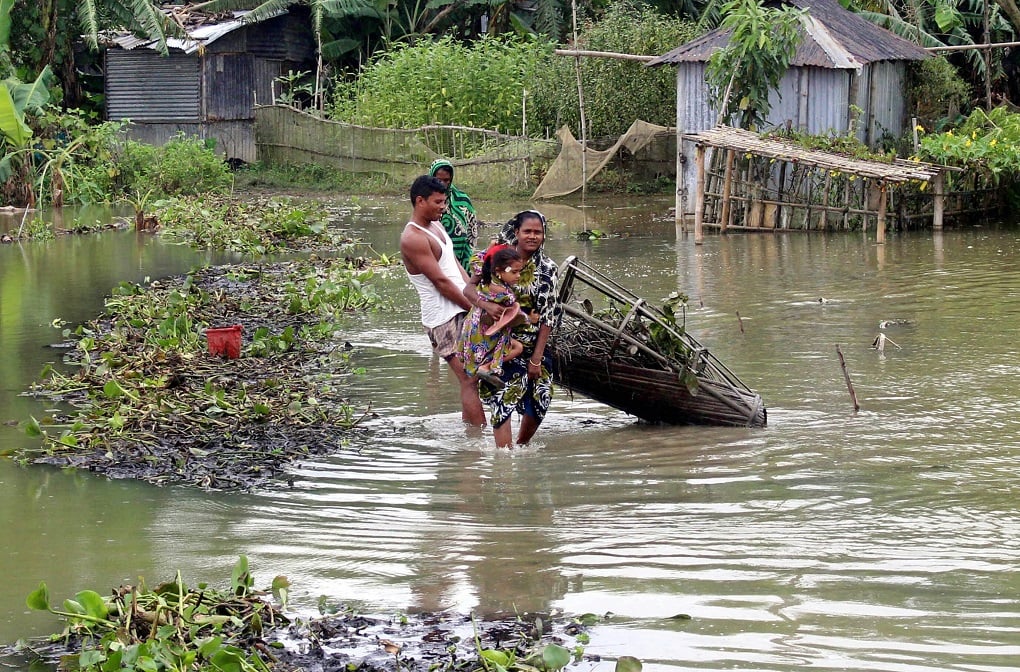 <p>Houses have been flooded in Moulvibazar, Bangladesh, and people are relocating [image by: Serajul Islam]</p>