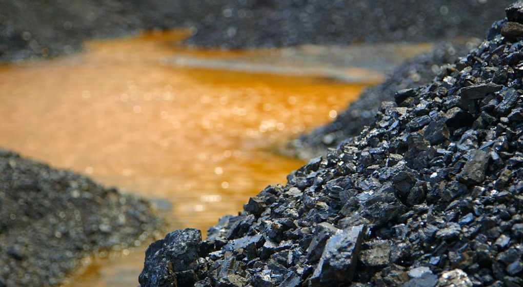 <p>Coal resting near water in the Indian state of Meghalaya. A still from the documentary Broken Landscape, part of the “Global Choke Point” series by the Wilson Center and Circle of Blue.</p>