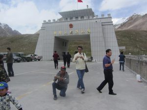 <p>Tourists on the Chinese side of the border [image by: Rina Saeed Khan]</p>