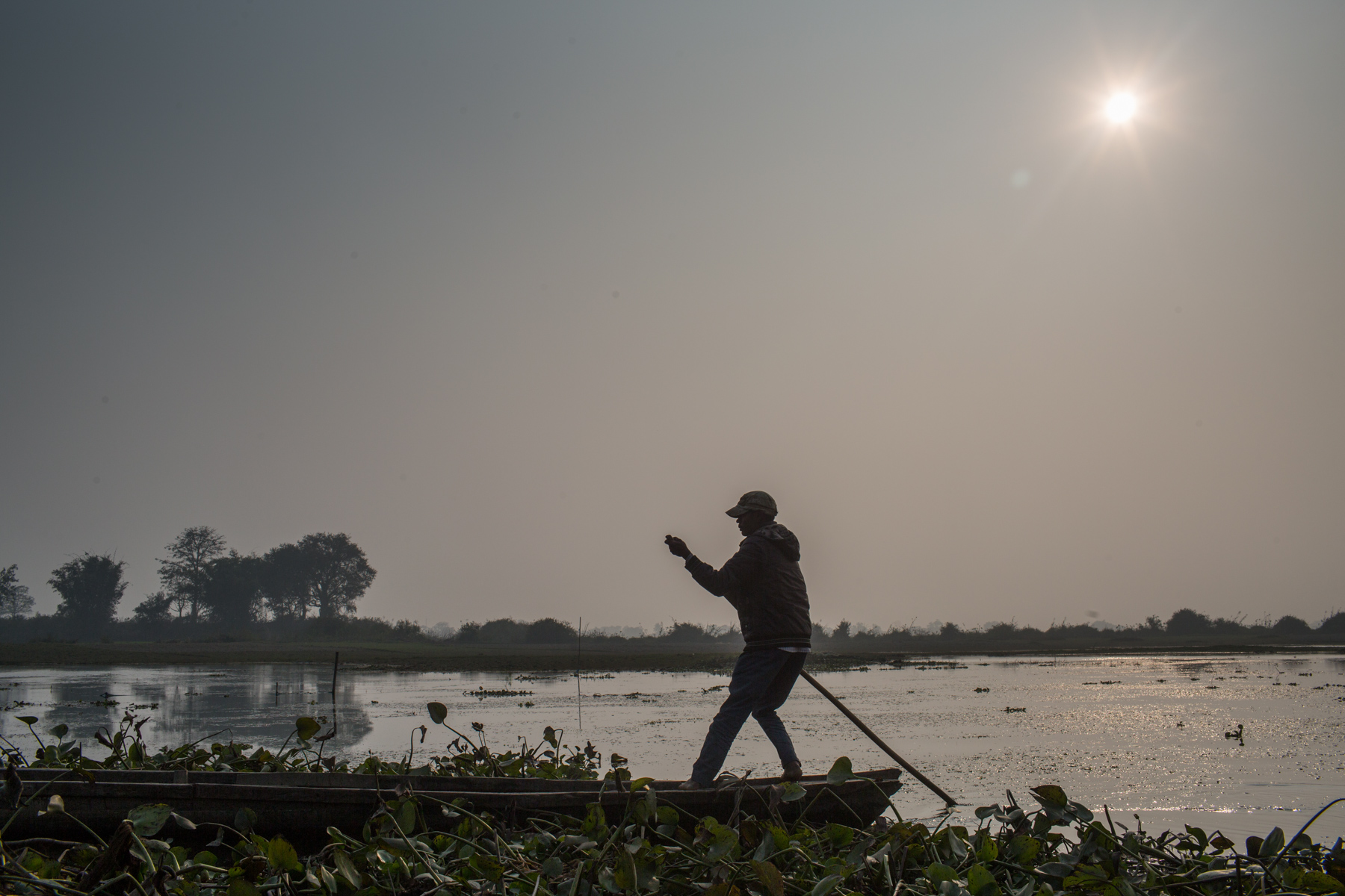 <p>Fisherman by the Koshi River in eastern Nepal. This area was declared a wetland of international importance in 1987—the first in the country [image by: Nabin Baral]</p>