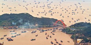 Boats leave the Shipu Fishing Port after a hiatus of three and a half months in Xiangshan County, east China’s Zhejiang province, 23rd Dec, 2014 [mage by: He Yousong/ Xinhua/ Alamy Live News]