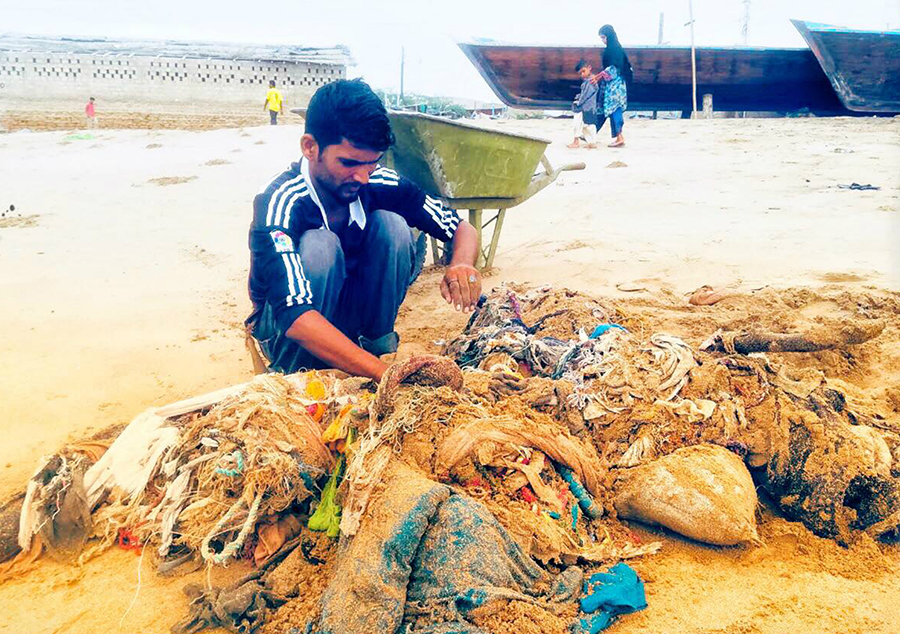 Sorting out garbage recovered from the ocean.
