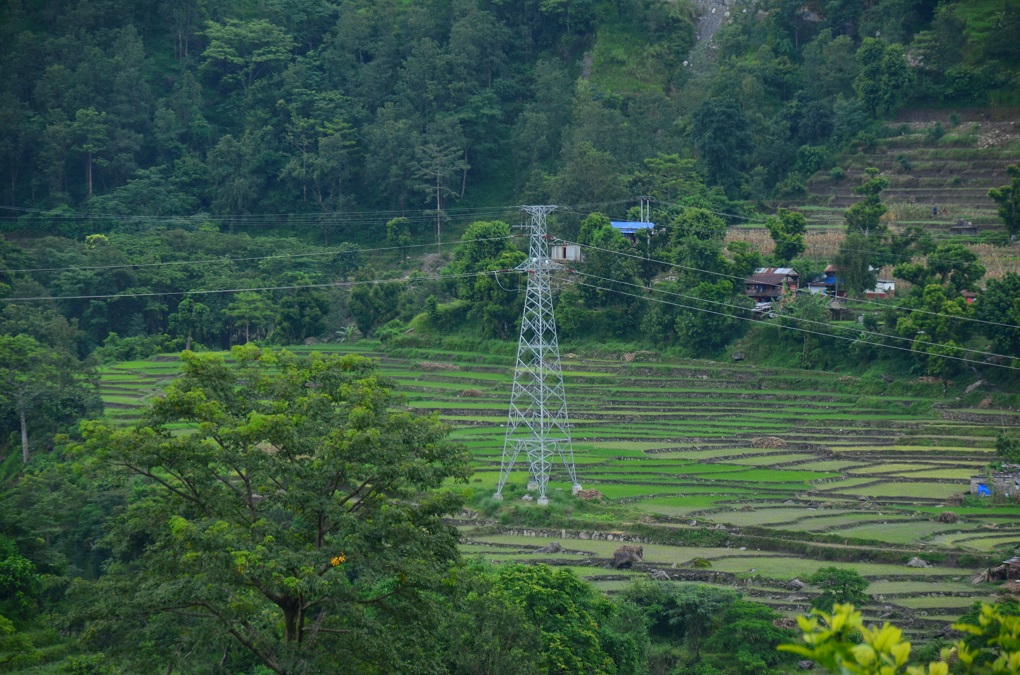 <p>Chinese implemented 132 kV Bhulbhule Mid-Marsyangdi high voltage transmission line in Lamjung district, Nepal, July 2018 [image courtesy: The Accountability Counsel]</p>