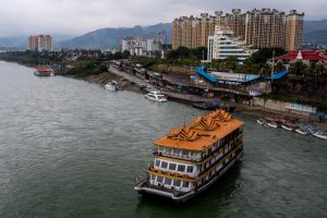 A restaurant and leisure ship floats down the Lancang (Mekong) in Xishuangbanna, Yunnan, China. (Photo: Luc Forsyth/A River's Tale)