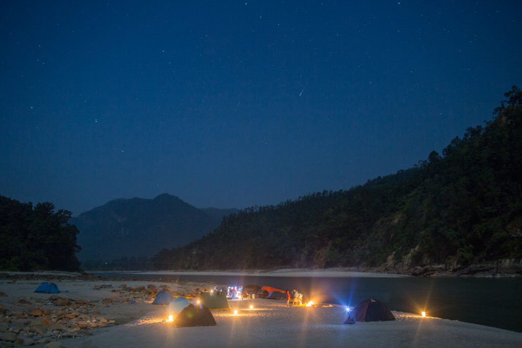 The scientific expedition team camps by the side of Karnali River in the Kailali district of Nepal [image by: Nabin Baral]