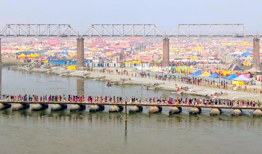 <p>The tent city at the confluence of the Ganga and Yamuna. The Kumbh Mela at Prayagrajthis year attracted more than 300 million people over a month and a half [image by: SoumyaSarkar]</p>