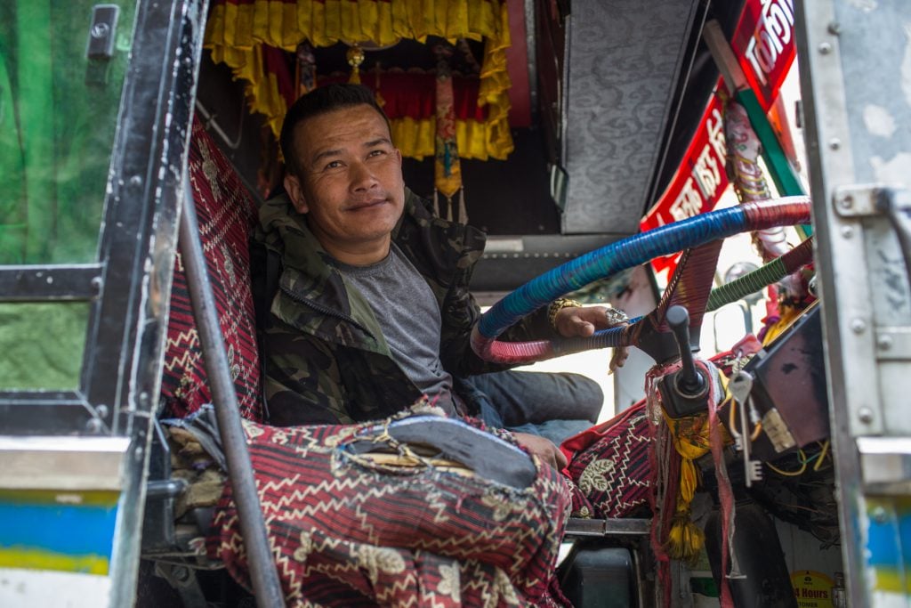 Truck driver waiting to cross the Nepal-China border at Rasuwa Gadhi