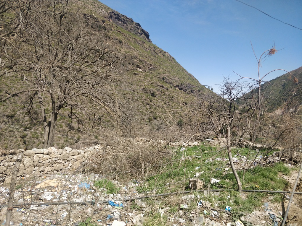 The trash is everywhere you look, and hills have been denuded in Swat [image by: Maha Qasim]