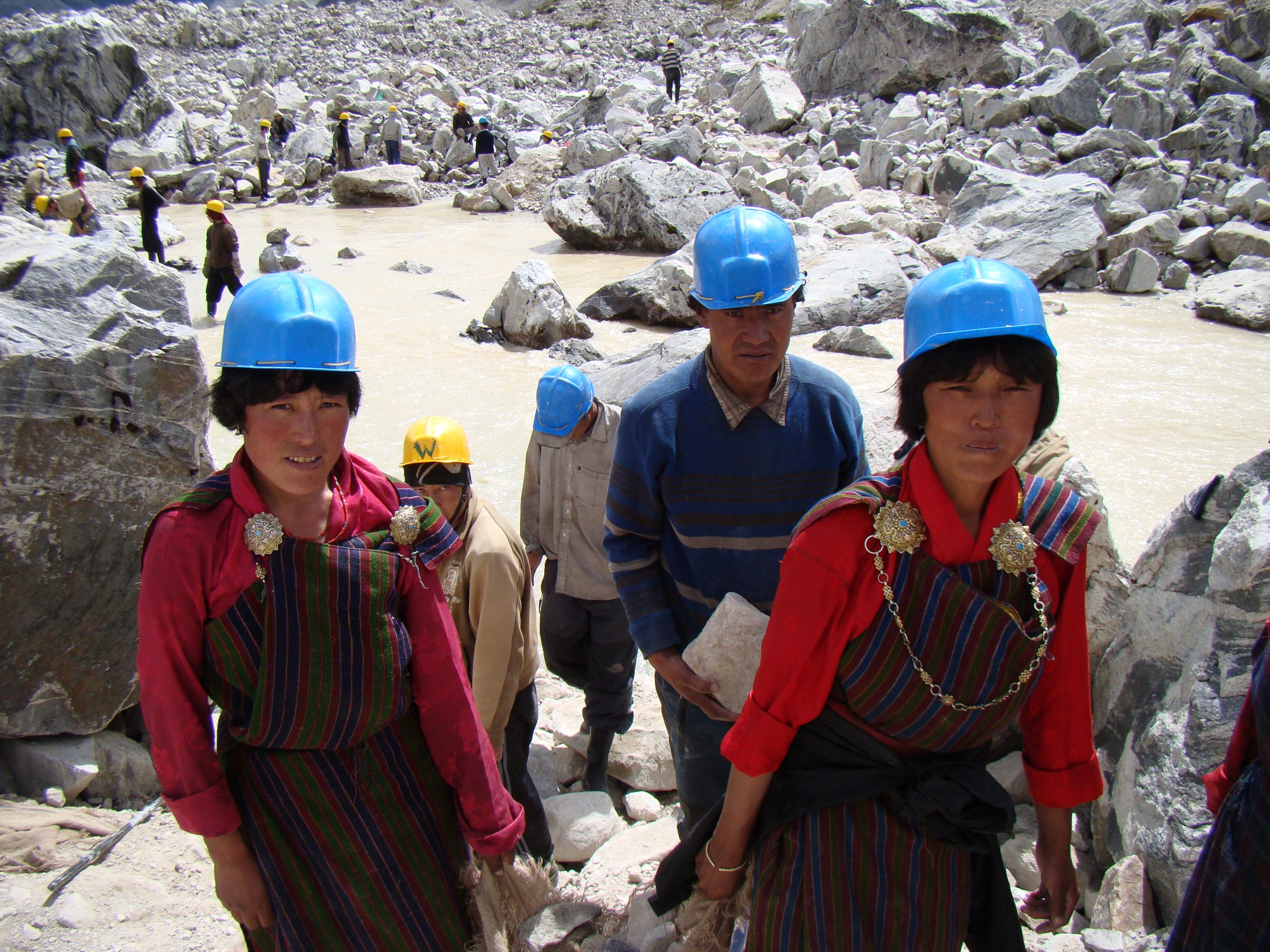 <p>Workers from the United Nations Development Programme in Bhutan are trying to reduce the risk of floods around Thorthormi lake (Image: United Nations Development Programme)</p>