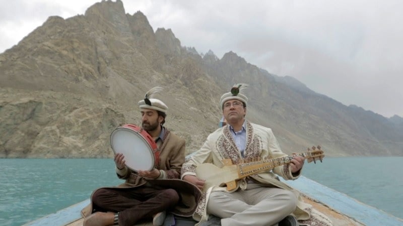Gulbaz Karim playing the Charda on a boat in the Hunza Valley [Video still courtesy: Indus Blues]