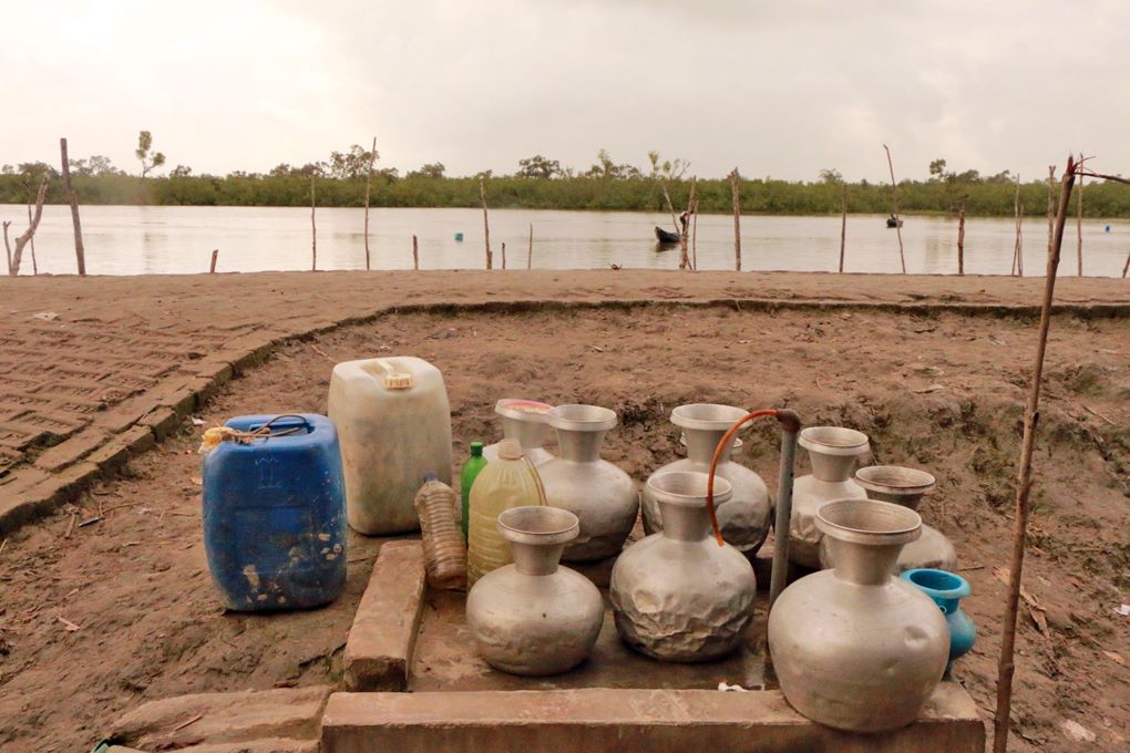 A drinking-water distribution station for villagers in a south-western district of Bangladesh, where development of shrimp and fish farming increased water salinity and decimated almost all freshwater sources [image by: Mohammad Arju]