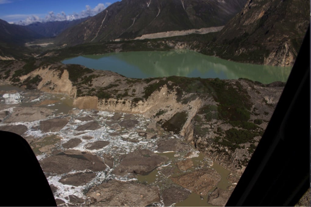 Fresh scouring/landslides can be seen on the moraine dam that separates lakes Thorthormi with Raphstreng [image courtesy: National Centre for Hydrology and Meteorology]