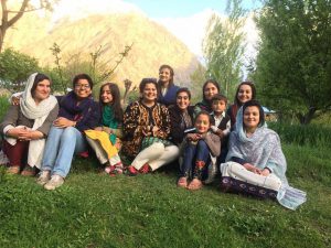 <p>The Climate Stories Pakistan team with a family in Sonoghur Valley, Chitral [image courtesy: Climate Stories Pakistan/National Geographic Society]</p>