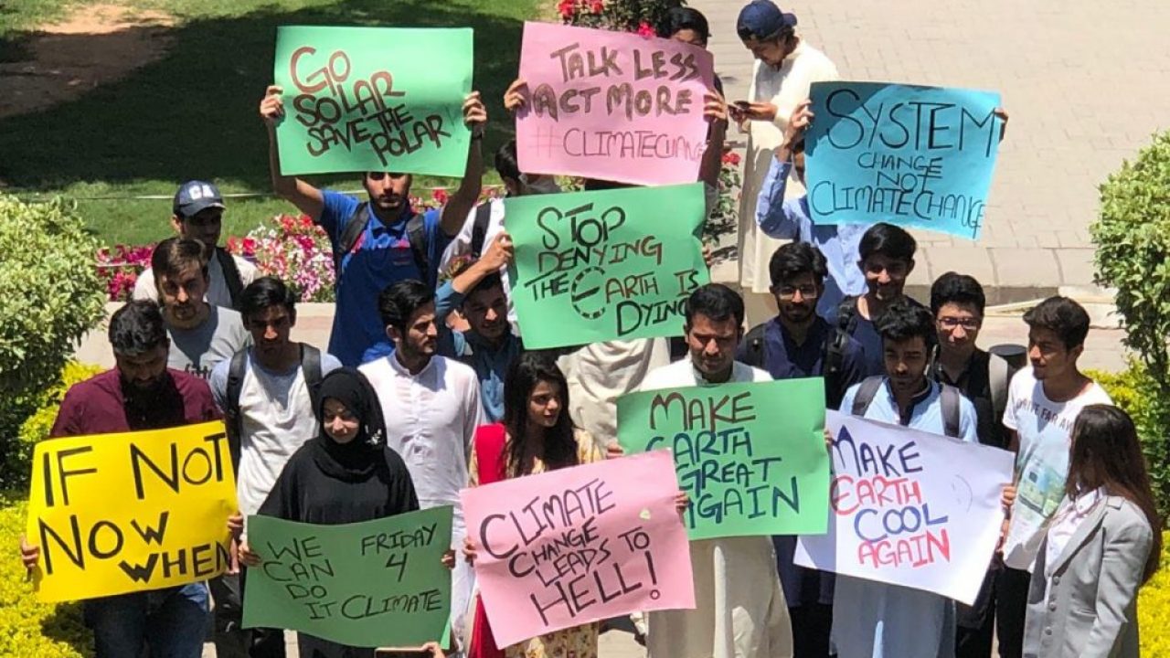 Climate activists in Karachi, Pakistan holding signs in the march for the climate [image courtesy: FridaysForFuture Pakistan]