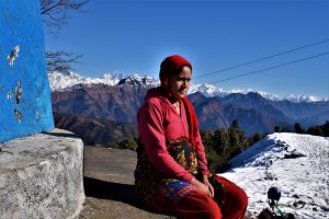 <p>In a village close to the transboundary Mahakali river, a pregnant woman awaits news of remittance from her husband working abroad [All images by: Minket Lepcha]</p>