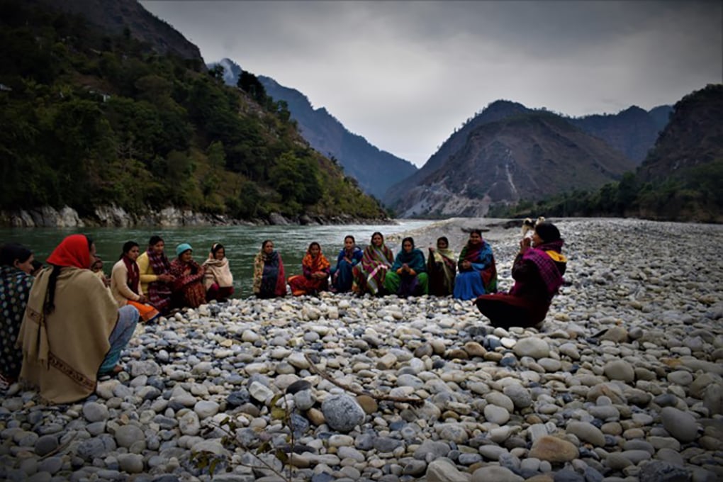 A Women's Empowerment Committee meeting on the Mahakali riverbed