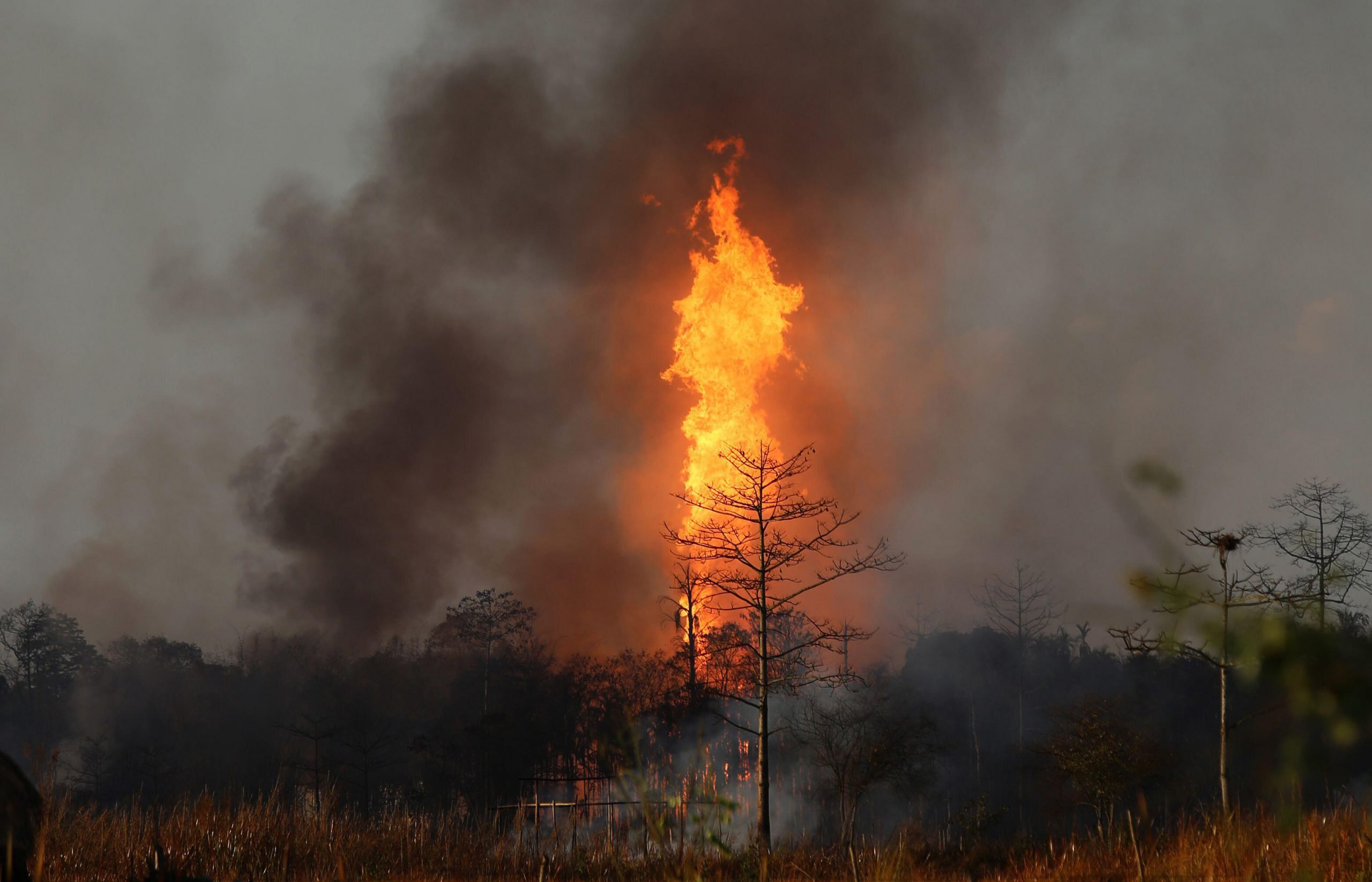 <p>Flames from a blown-out gas well in Assam, India (Image:  Xinhua/Alamy)</p>