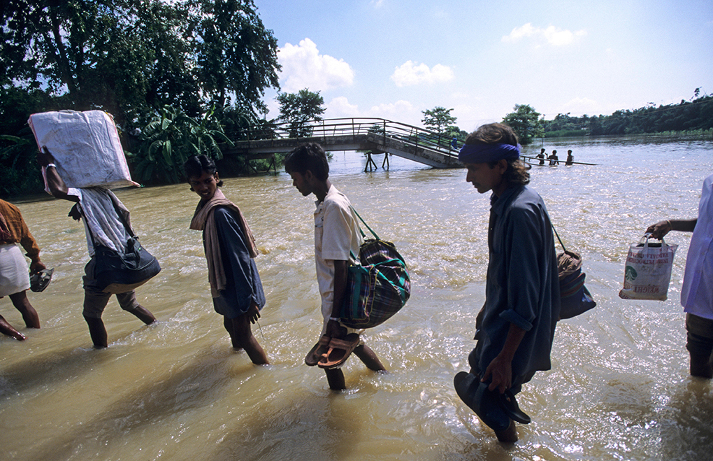 <p>Flooding of the River Bagmati, a tributary of the Ganga, in Bihar [image by: Joerg Boethling/Alamy]</p>