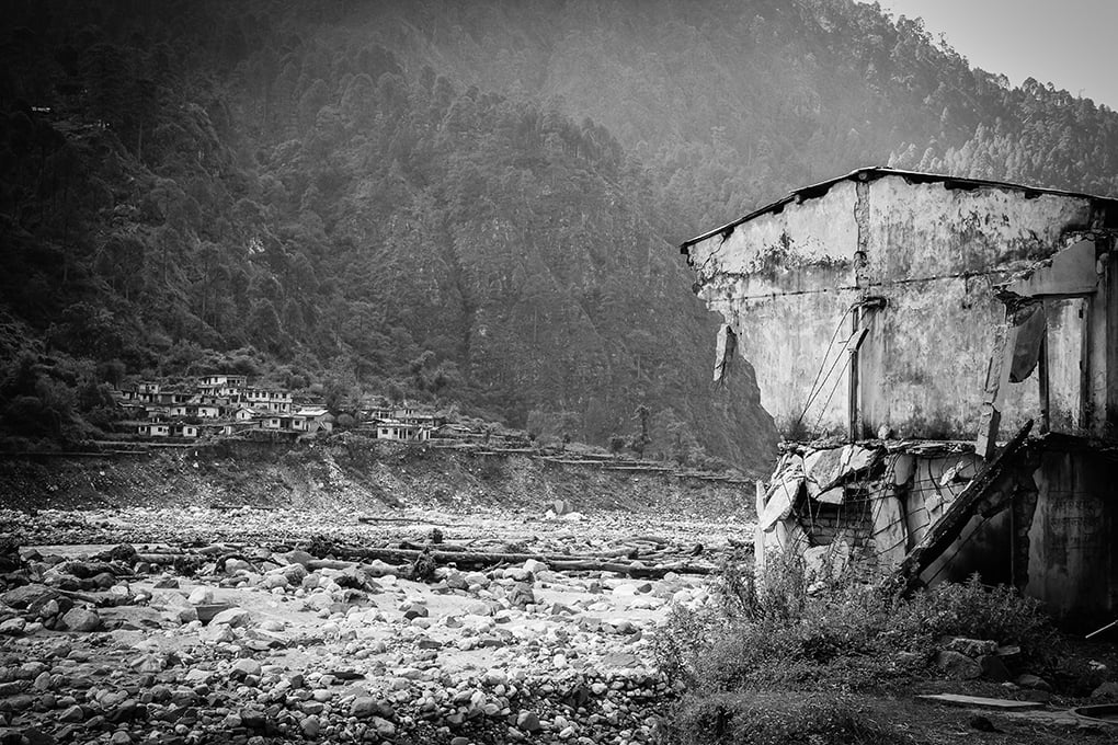 <p>Damaged house at Bhagirathi valley near Maneri Bhali hydroelectricity project during the 2013 floods in Uttarakhand [All images by: Sumit Mahar]</p>