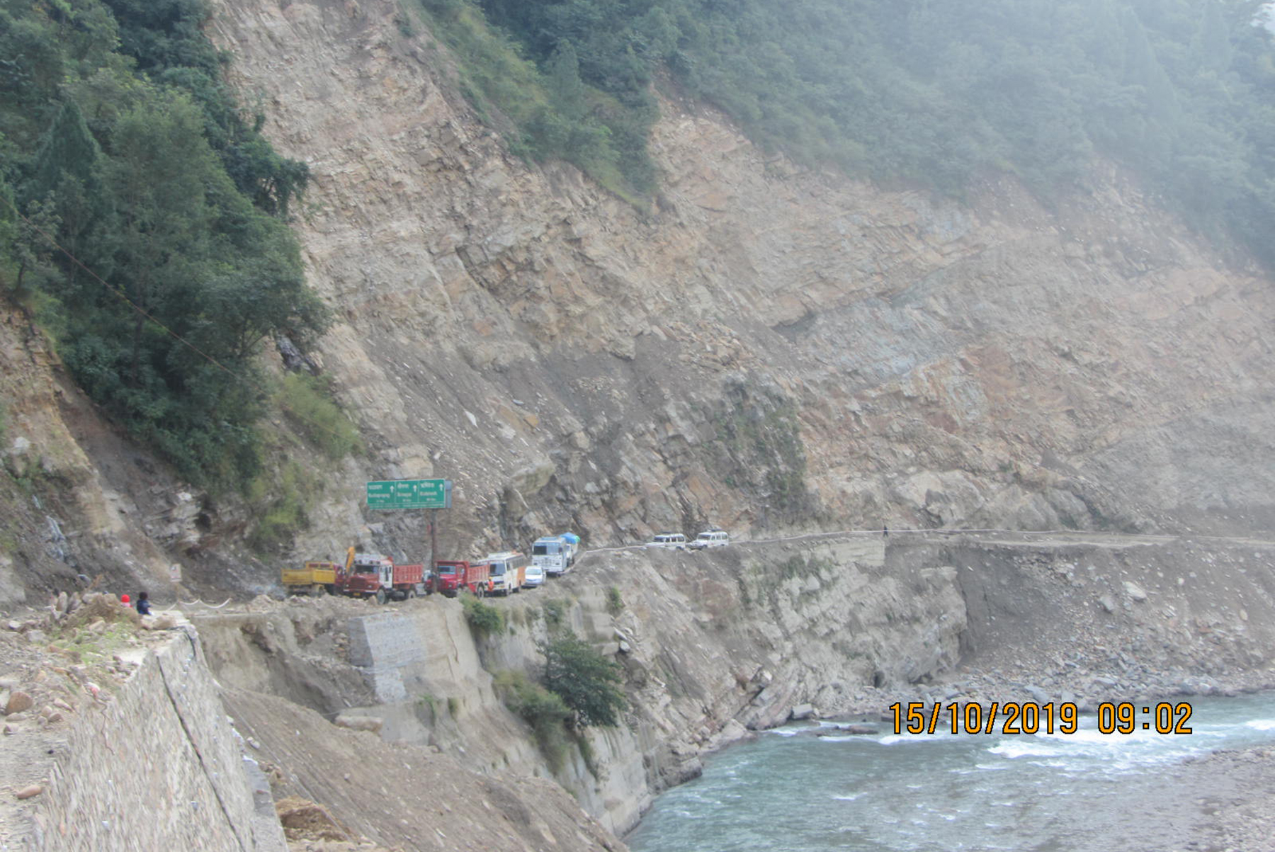 <p>Vehicles stranded due to a landslide atop a road being widened under the Char Dham Project [Image by Hemant Dhyani]</p>