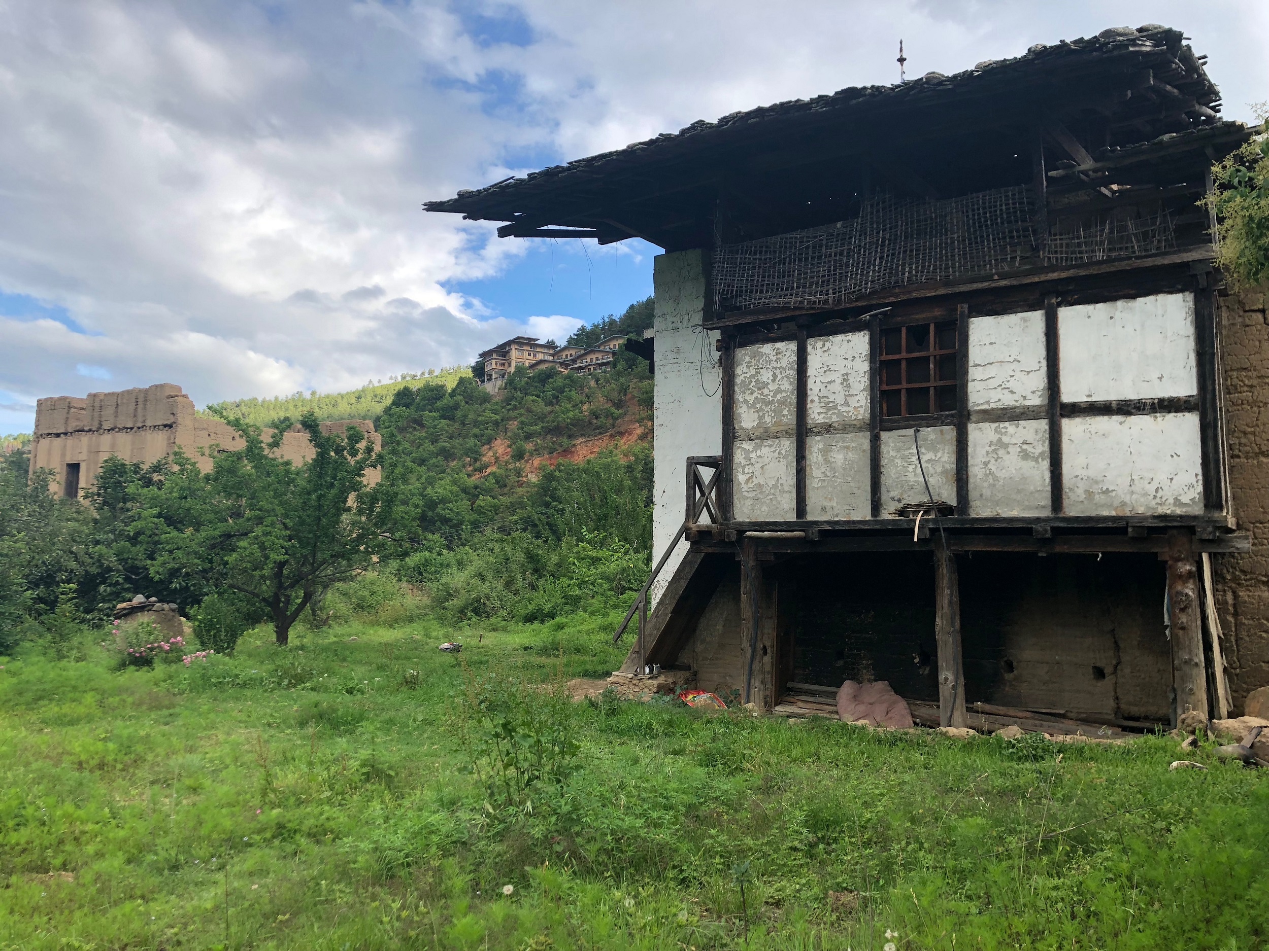 An empty traditional house, which has been locked up for more than 15 years, in Dagepela, Dagana