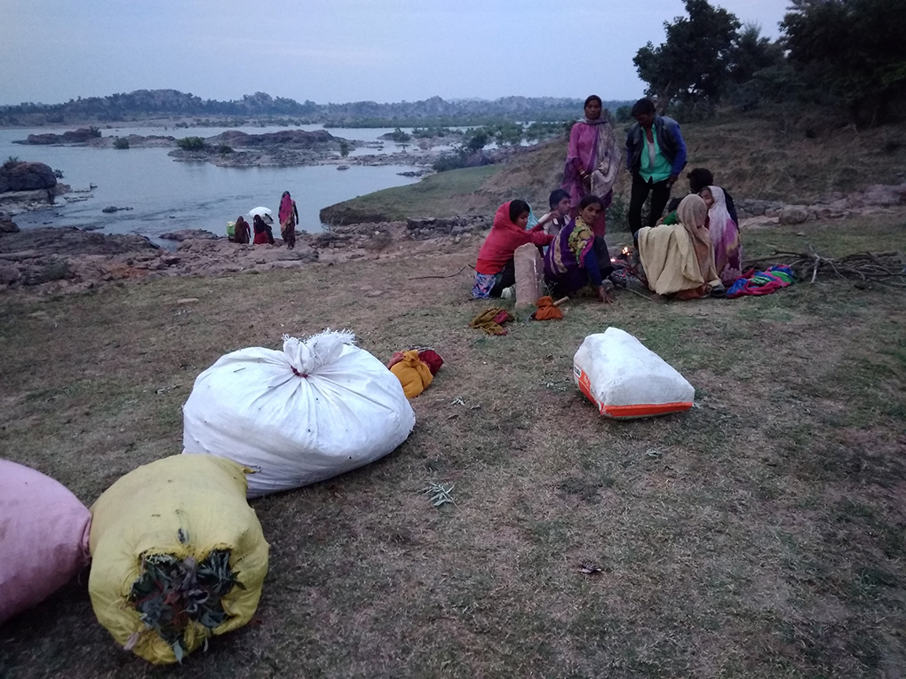 Devi and her relatives await the ferry to cross the Betwa river