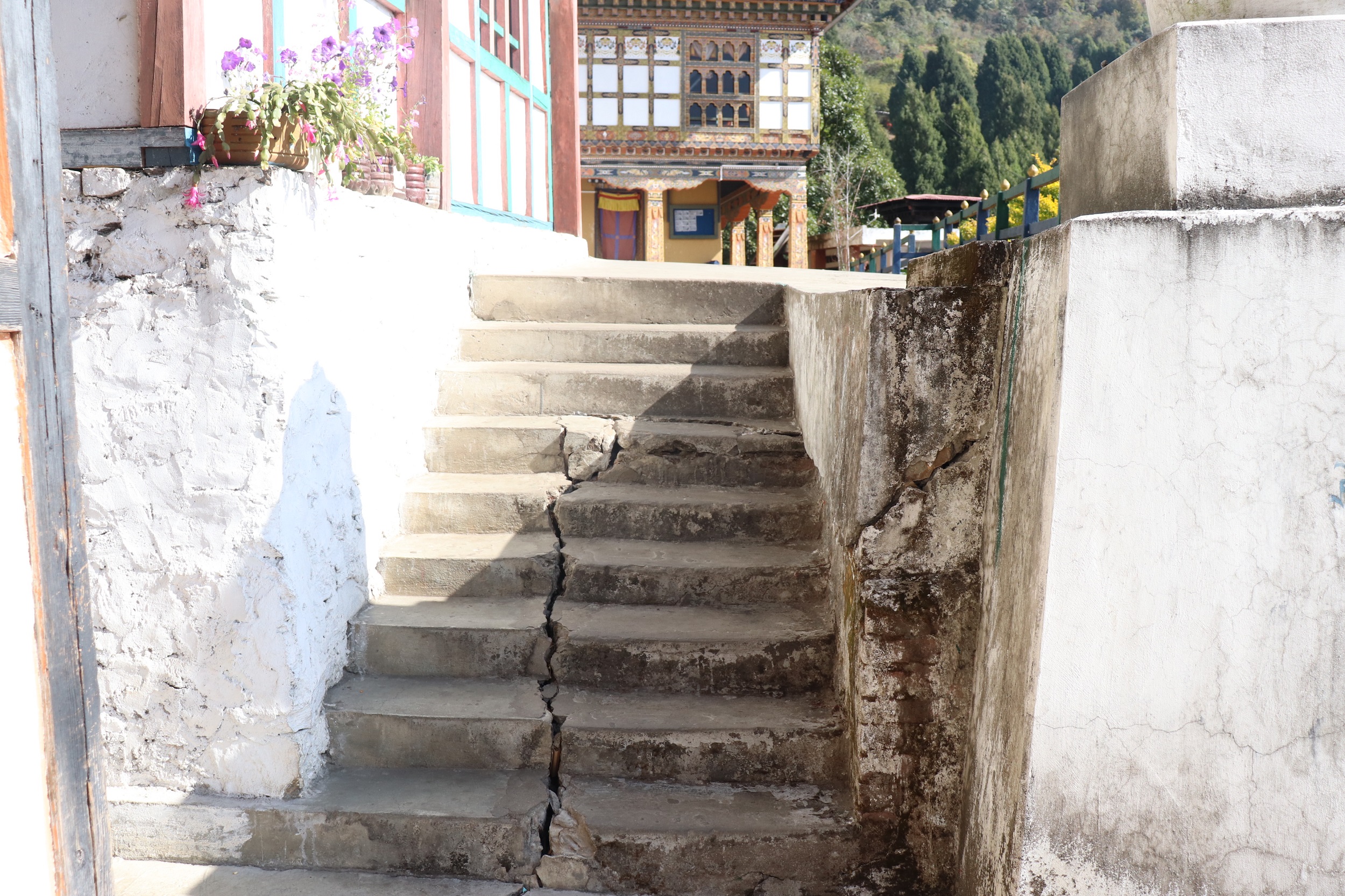 Cracks developed on the stairs of the Kuengacholing nunnery, Trongsa; they were repaired but the cracks appeared again 