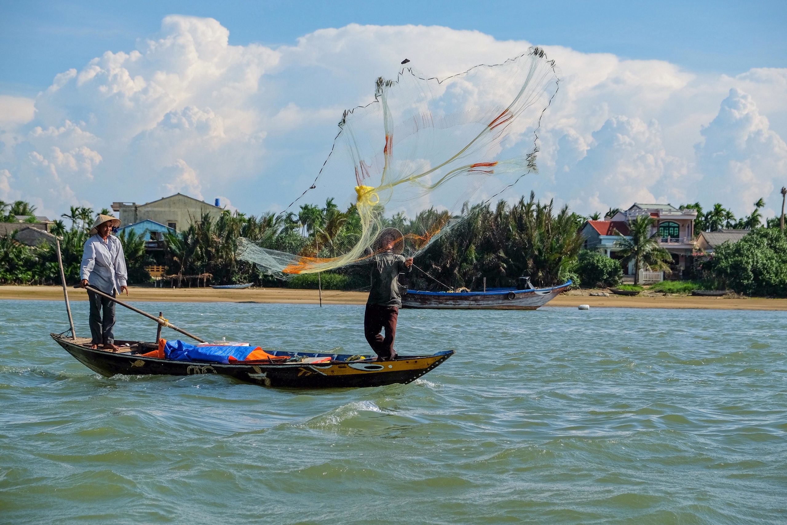 <p>Fishers on the Mekong river in Vietnam. Up to 60 million people depend on the Mekong for food and livelihoods. The 4,350-kilometre waterway originates in China before flowing through Myanmar, Laos, Thailand, Cambodia and Vietnam [Image: Alamy]</p>