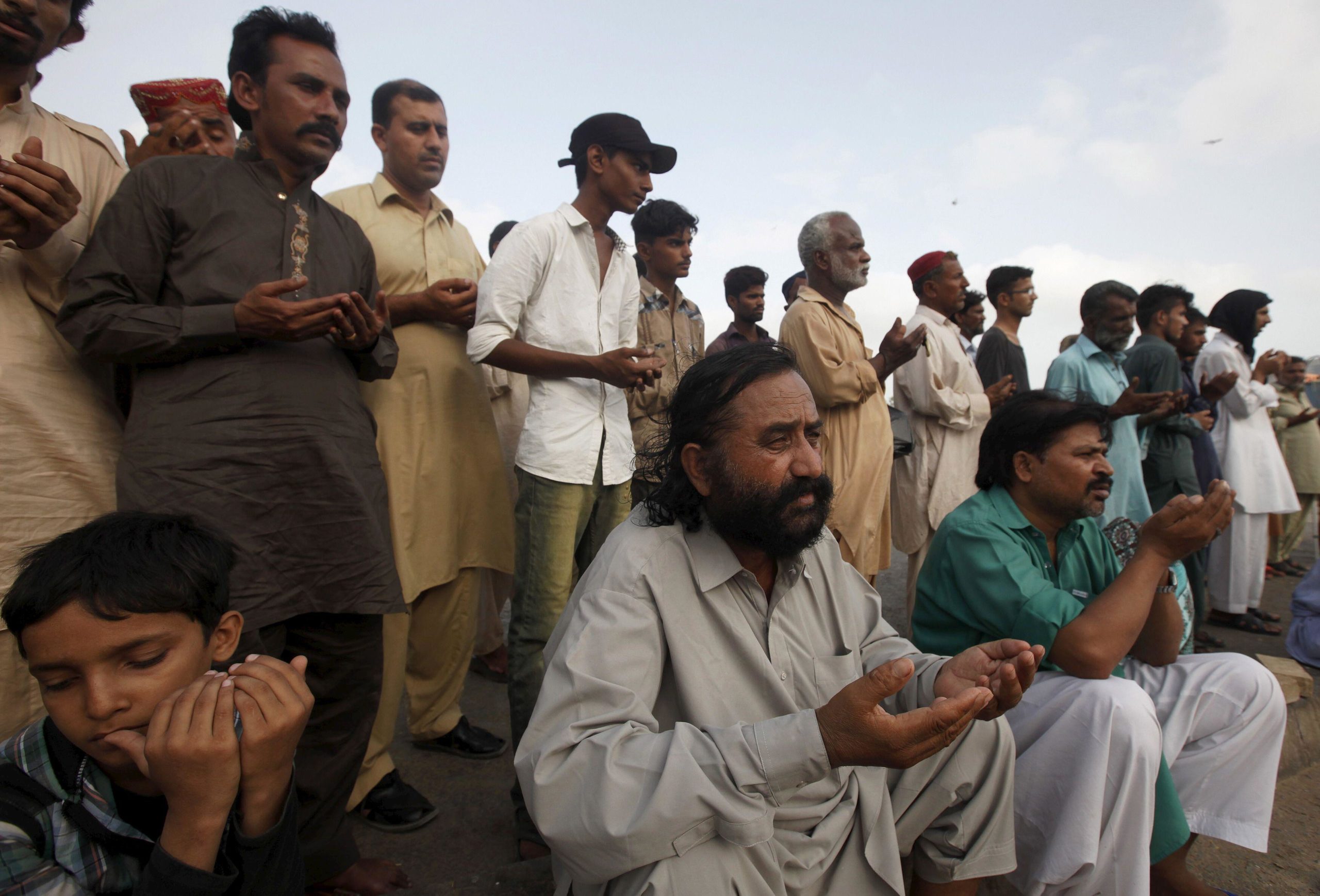 Prayer, rain, heatwave, Karachi, Pakistan , REUTERS/Akhtar Soomro