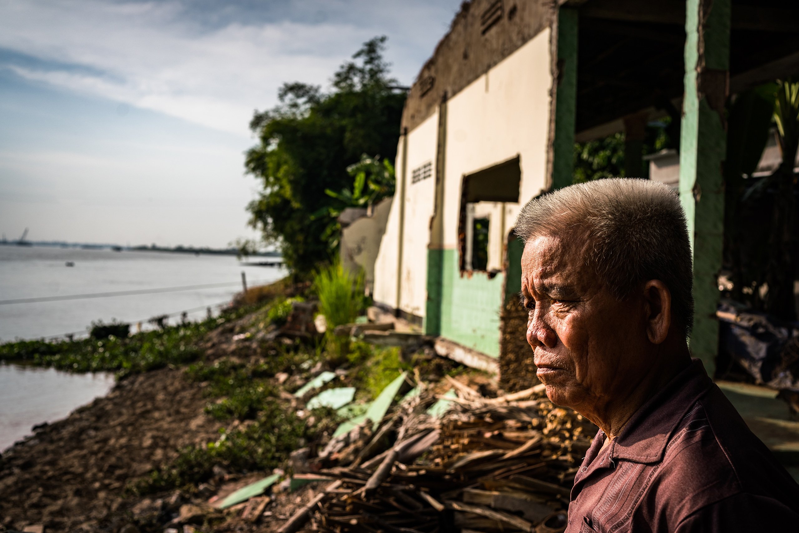 <p>Since their neighbours’ house collapsed due to erosion, Nguyen Van Thuong (pictured) and his wife Lam Thi Le have been afraid they too will soon lose their home a few metres from the Tien river in southwest Vietnam (Image: <a href="http://www.quinnmattingly.com/">Quinn Ryan Mattingly</a>)</p>