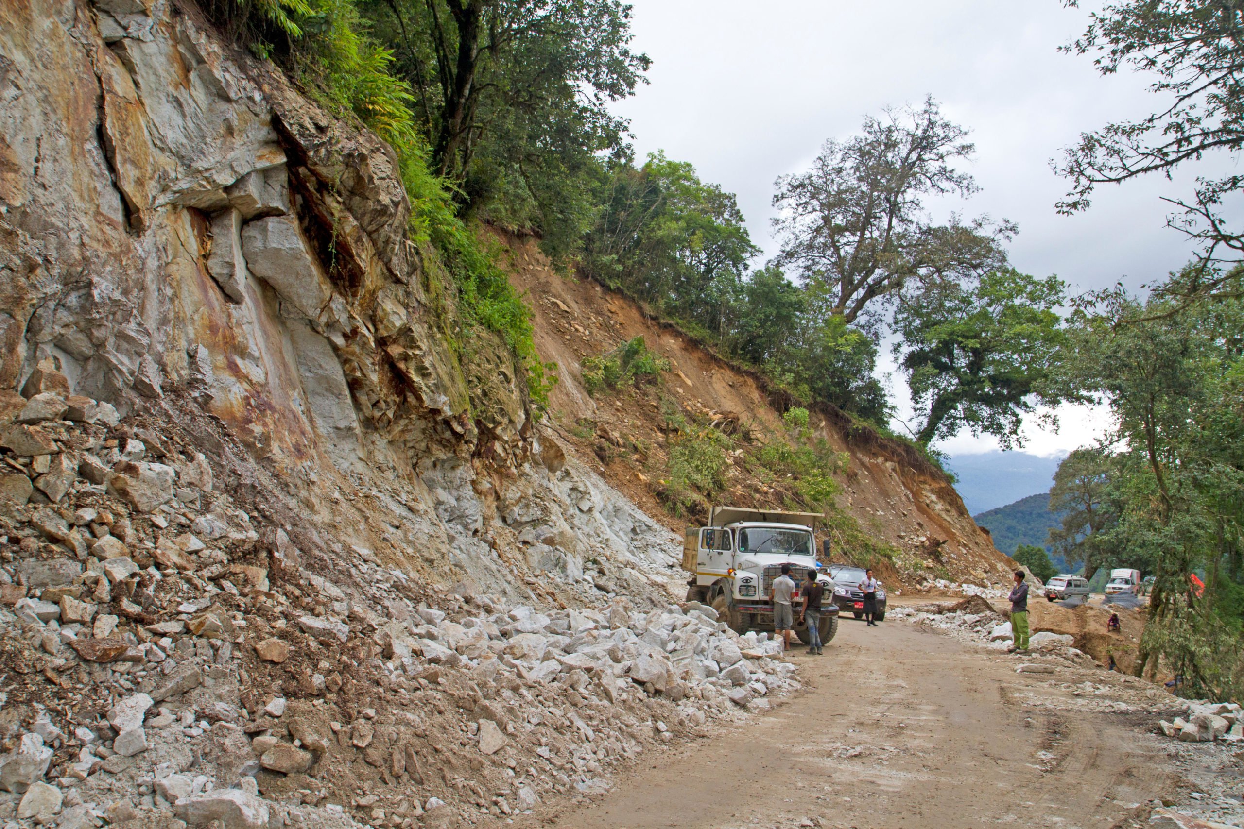 <p>Landslide on Bhutan’s national highway in August 2016 near the Phobjikha Valley (Image: Alamy)</p>