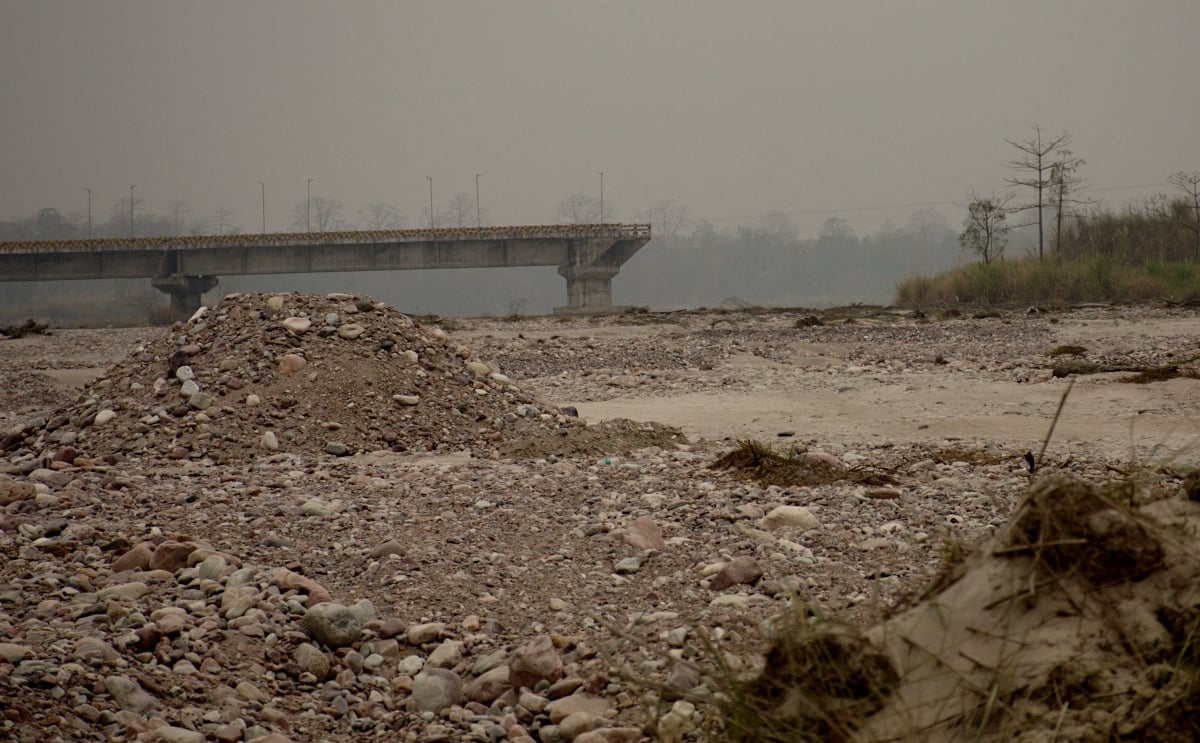 <p>The remains of the bridge over the Sesseri River supposed to connect Bizari village to the rest of the district (Image: Chintan Sheth)</p>