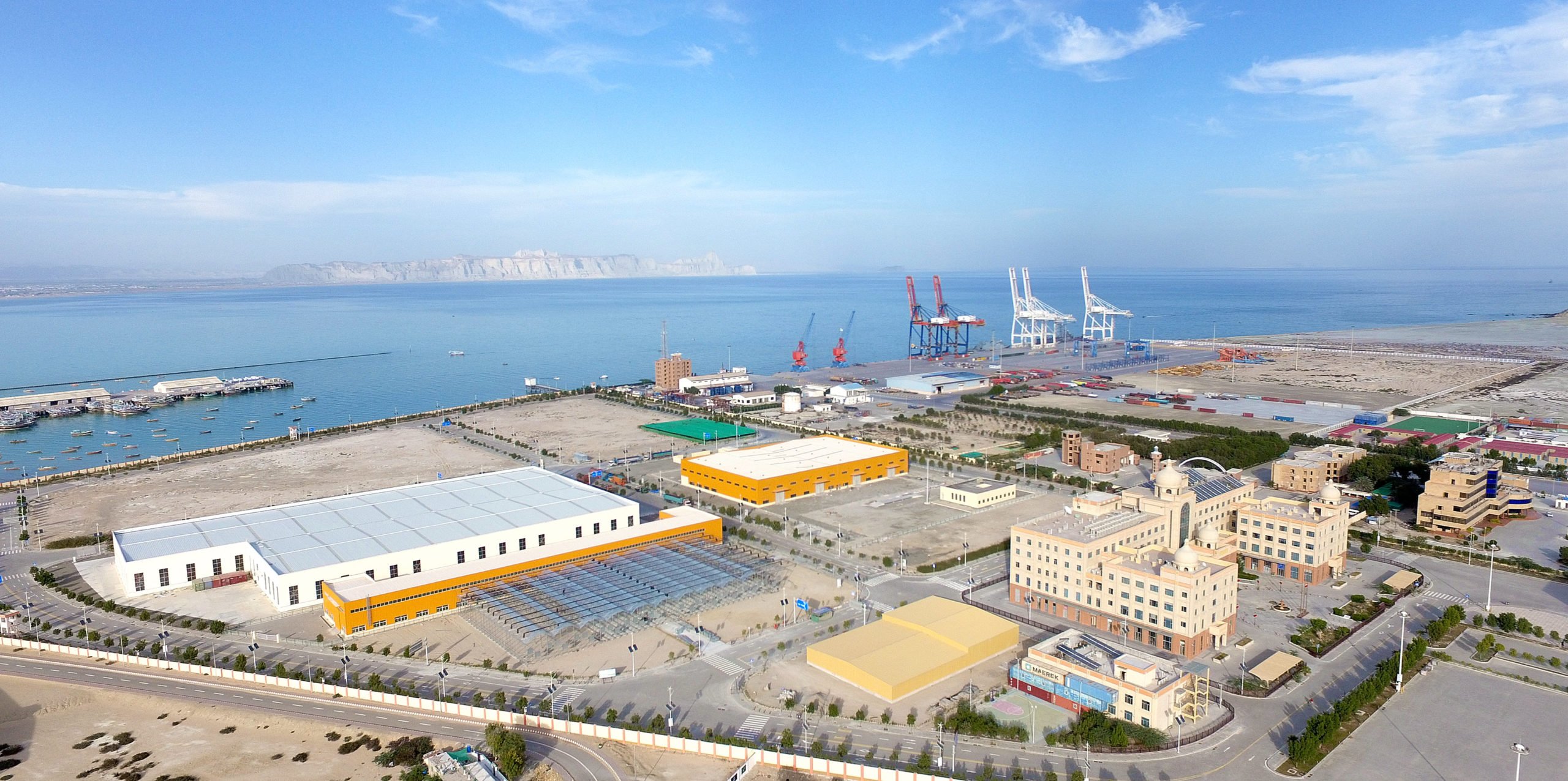 <p>The Gwadar Free Zone and port area. Business was slow at the port when The Third Pole visited in April 2021. (Image: Shabbir Ahmed)</p>
