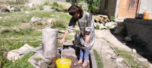 A girl collects drinking water at a tap in the Yasin valley, Gilgit-Baltistan, Pakistan (Image: Nowroz Ali)