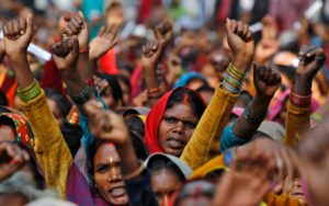 <p>A 2011 protest by indigenous forest communities against control over their lands by the Forest Department in New Delhi (Image: Reuters / Parivartan Sharma / Alamy)</p>