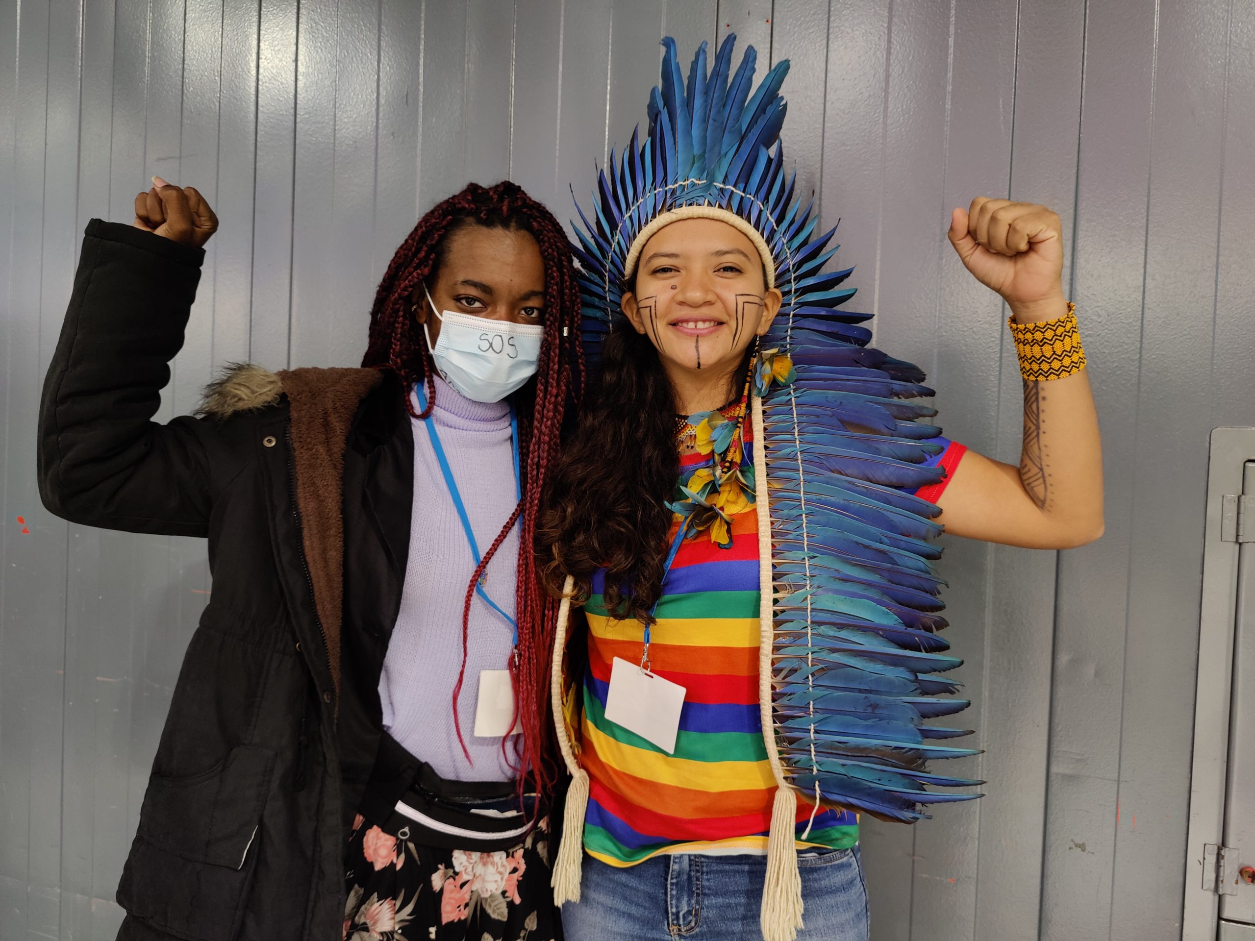 Youth at COP26. Isvilaine da Silva Conceicao (left) and Jaciara Beatriz Sousa de Vasconcelos from Brazil said that the high costs of attending a COP in a developed country meant that a lot of indigenous voices were left out. (Image: Disha Shetty)