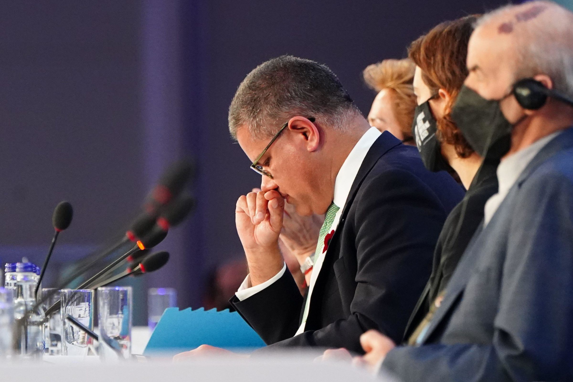COP26 President Alok Sharma fights back tears as he apologises to delegates for the last-minute watering down of the Glasgow climate pact’s language on eliminating coal power (Image: Jane Barlow / Alamy)