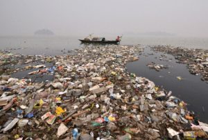 <p>The polluted waters of the Brahmaputra in Guwahati (Image: Reuters / Alamy)</p>