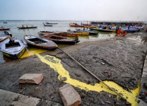 <p>Pollution flows into the Ganga River in India’s holy city of Varanasi (Image: Alamy) </p>
