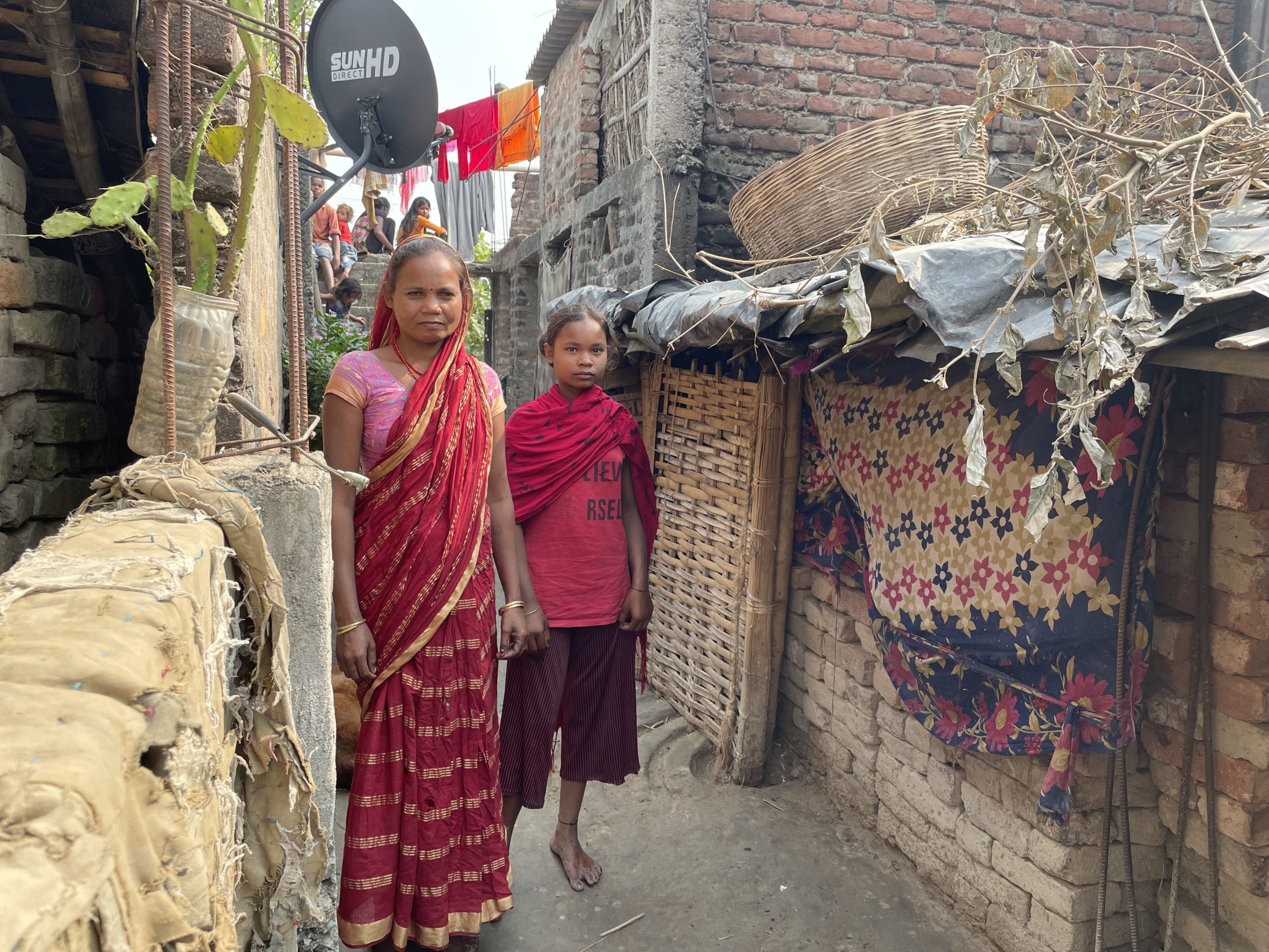 Bina Devi with her 12-year-old daughter in Devipur village in Bihar’s Katihar district