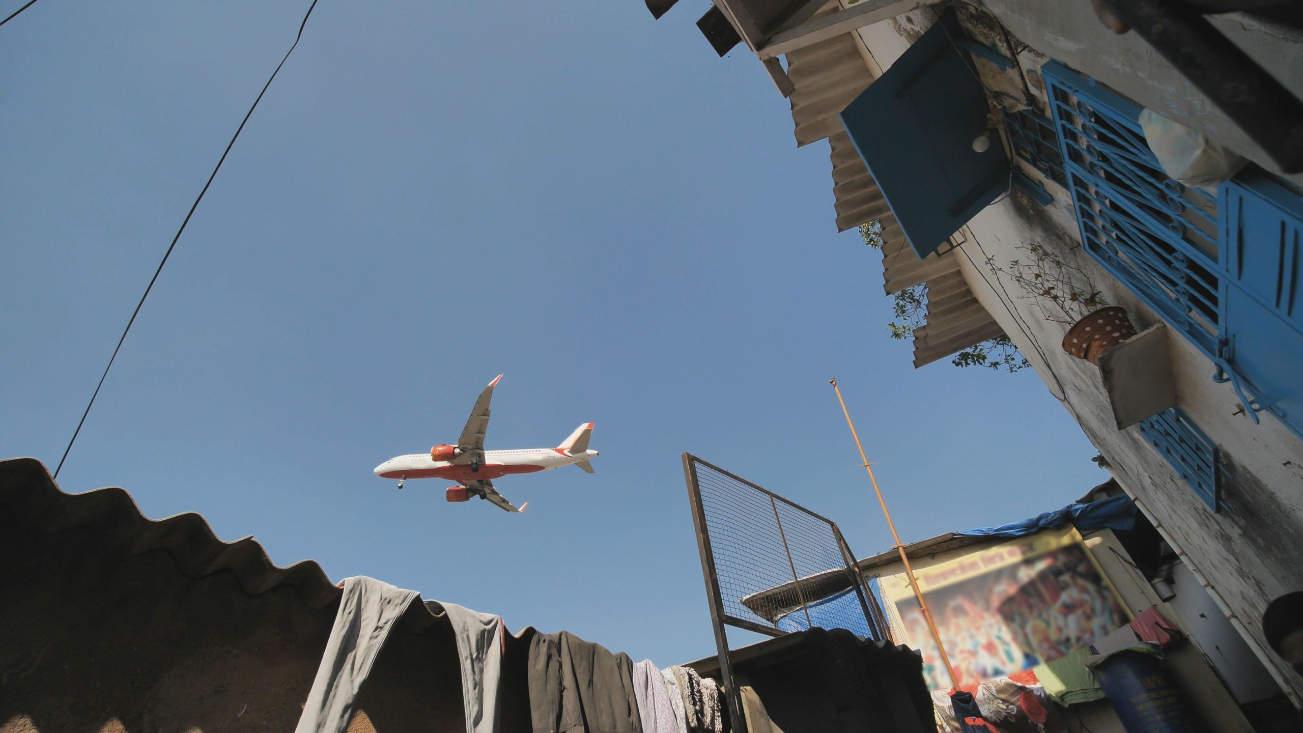 A plane flying over Mumbai, India